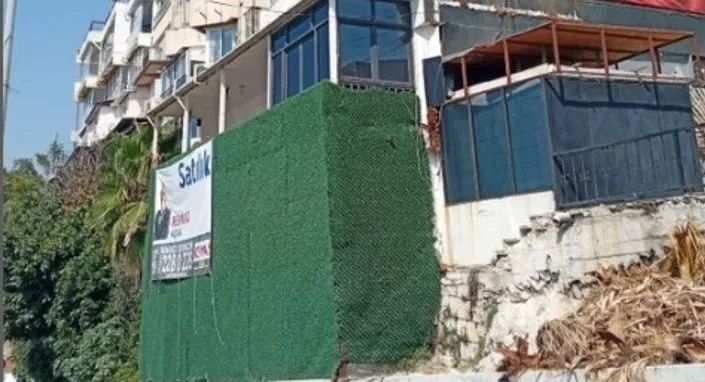 ANTALYA FALEZLERİNDEKİ YARIKLARI ÖRTÜP ÜZERİNDEKİ YAPILARI SATIŞA ÇIKARDILAR